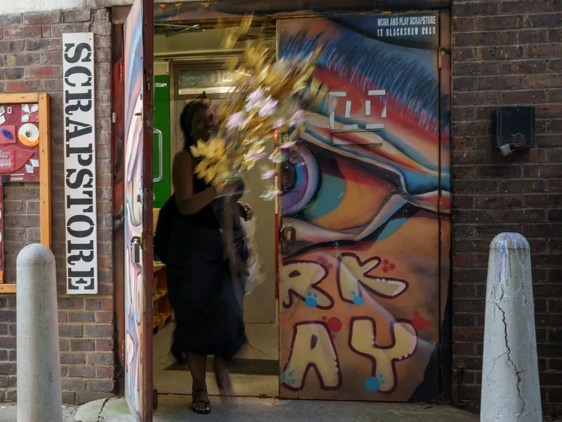 The Scrapstore entrance on Blackshaw Road: the SCRAPSTORE sign and the painted mural door
