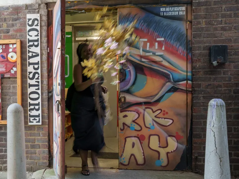 The Scrapstore entrance on Blackshaw Road: the SCRAPSTORE sign and the painted mural door